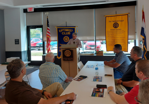 Club members Richard and Nicci posing for a photo after Nicci won a fundraising competition